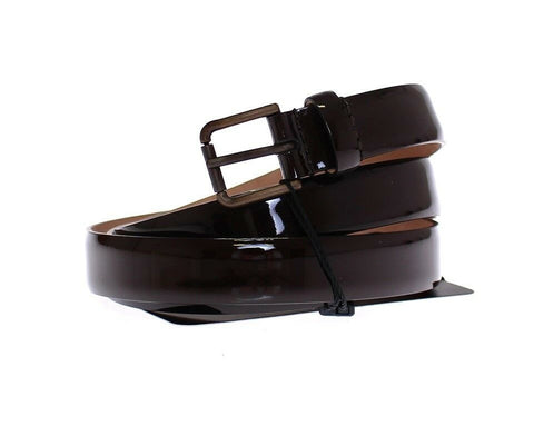 Brown leather Dolce & Gabbana logo belt with adjustable strap and metal buckle, showcasing the signature branding.