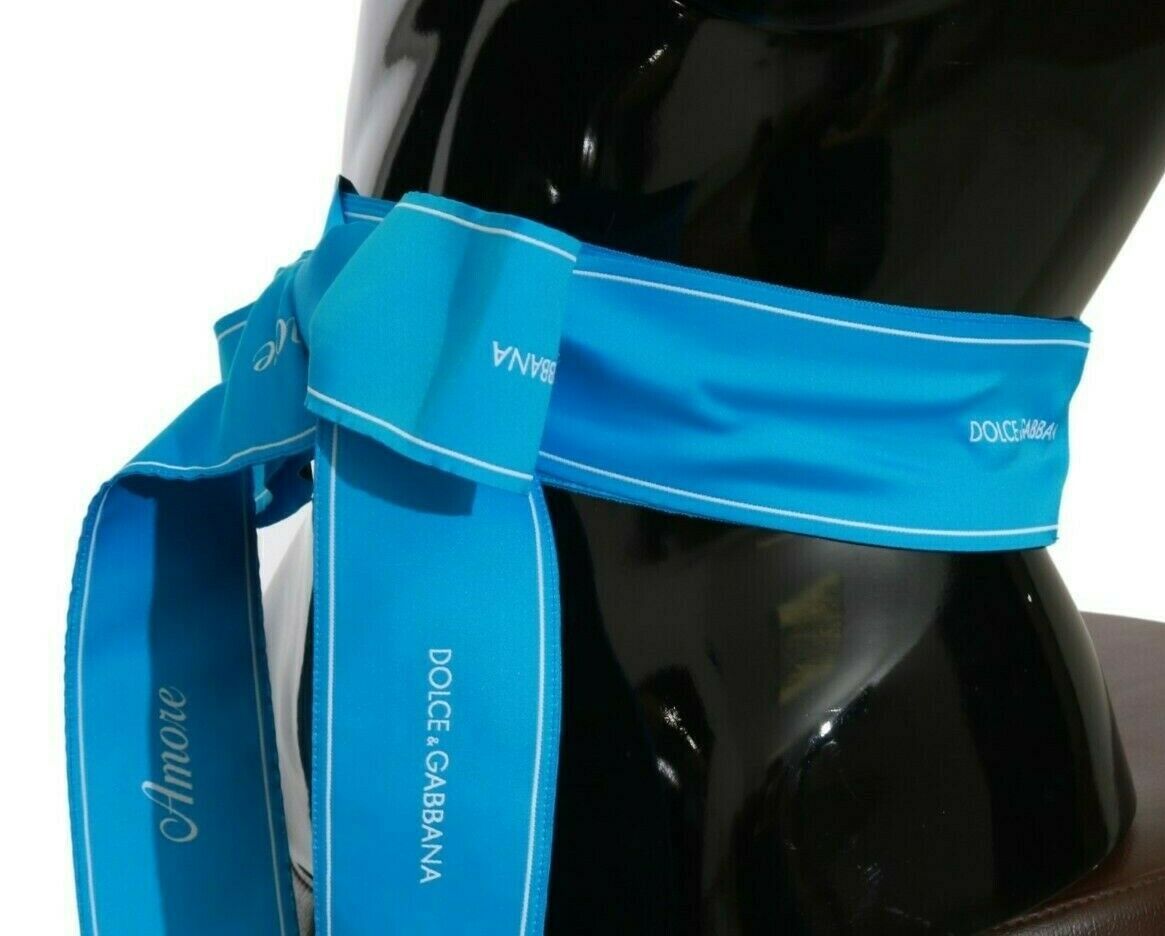 Blue Dolce & Gabbana waist ribbon wide bow belt with a large decorative bow and smooth satin finish.