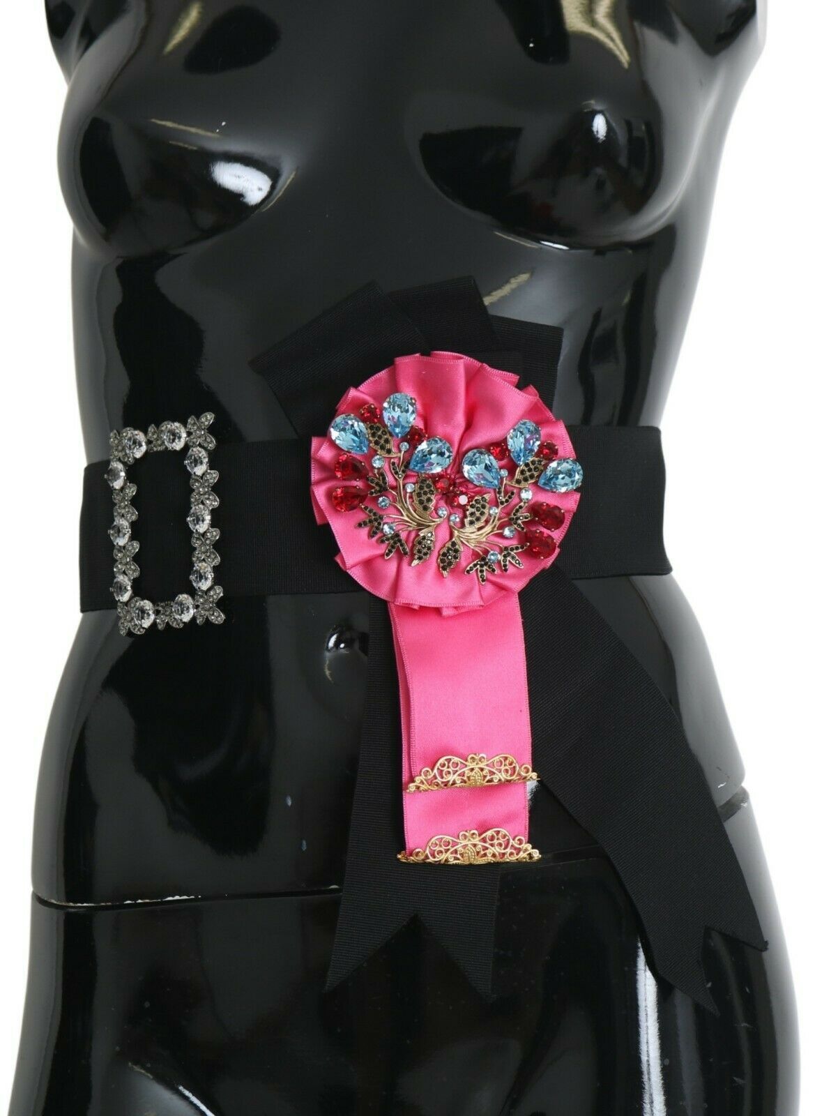 Black pink flower brooch with crystals and cotton belt by Dolce & Gabbana, shown on a white background.
