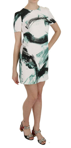 White, black, and blue Dolce & Gabbana shift mini dress with short sleeves, stylish and fitted for a modern look.