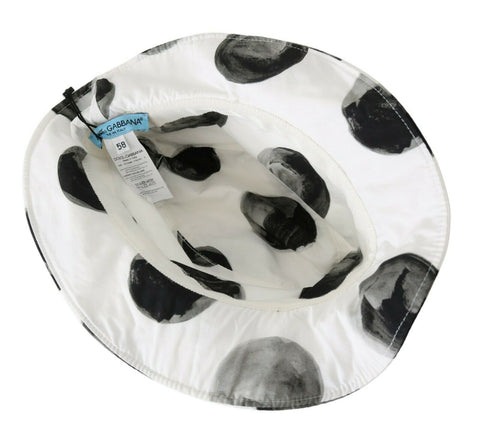 White cotton bucket hat with large black polka dots, Dolce & Gabbana fashion accessory, casual and stylish headwear.