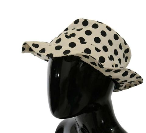 White 100% cotton polka dot trilby hat by Dolce & Gabbana, featuring a classic fedora style with a soft brim.