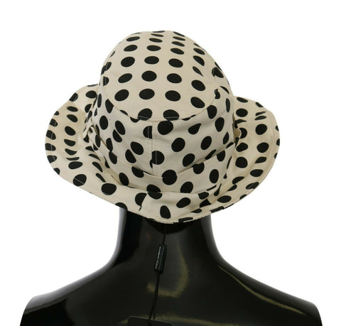 White 100% cotton polka dot trilby hat by Dolce & Gabbana with a classic brim and stylish design.