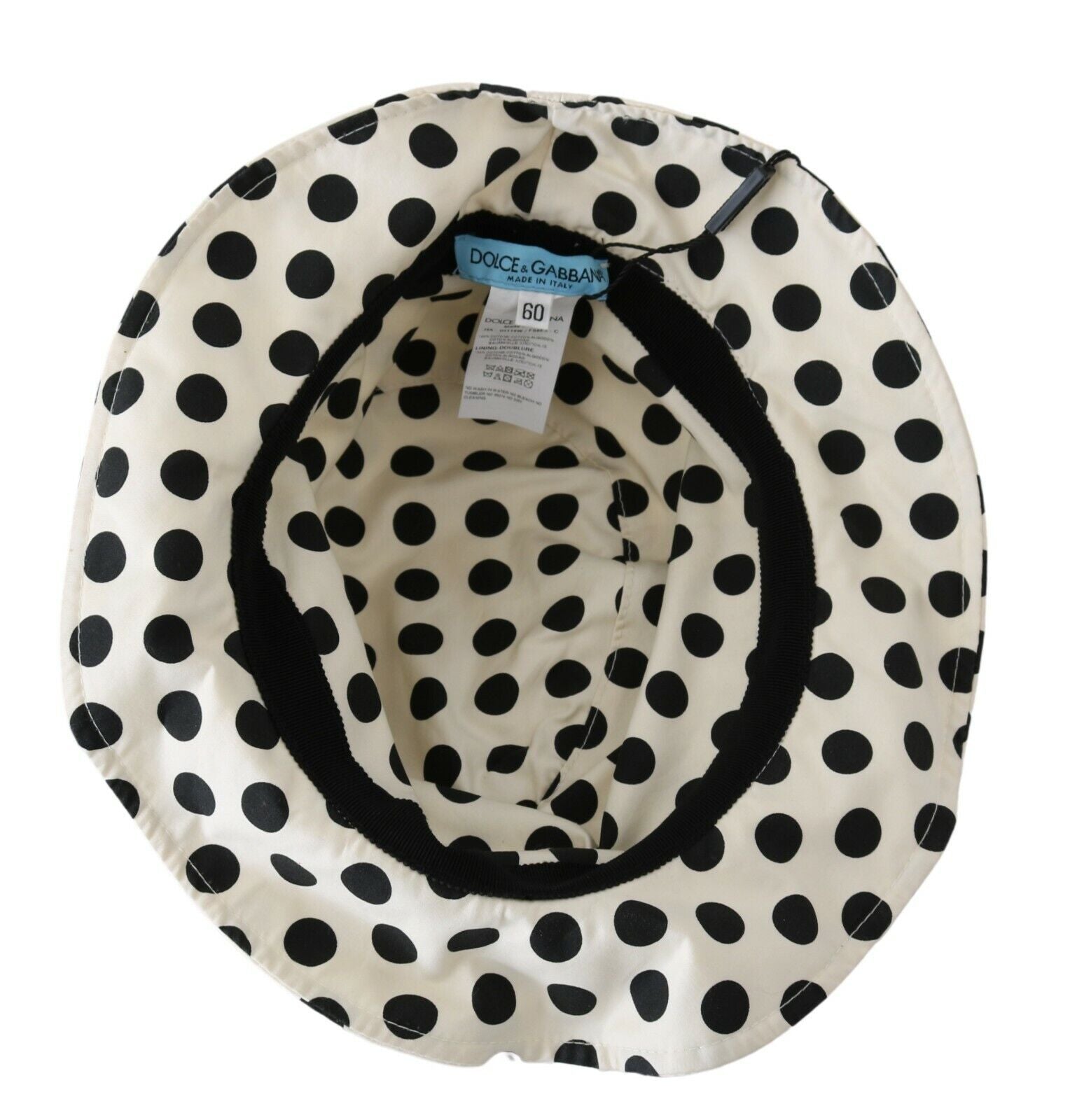 White 100% cotton polka dot trilby hat by Dolce & Gabbana, featuring a classic design with a narrow brim and stylish pattern.