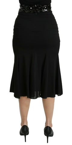 Black mermaid high waist midi silk skirt by Dolce & Gabbana, showcasing sleek fit and elegant design with a smooth silk finish.