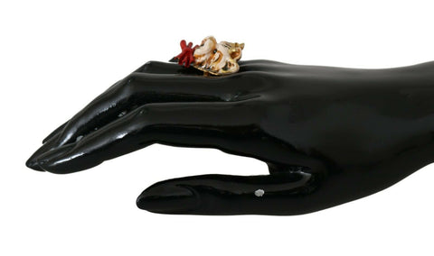 Gold brass resin beige dog pet accessory ring by Dolce & Gabbana with branded detailing and decorative design.