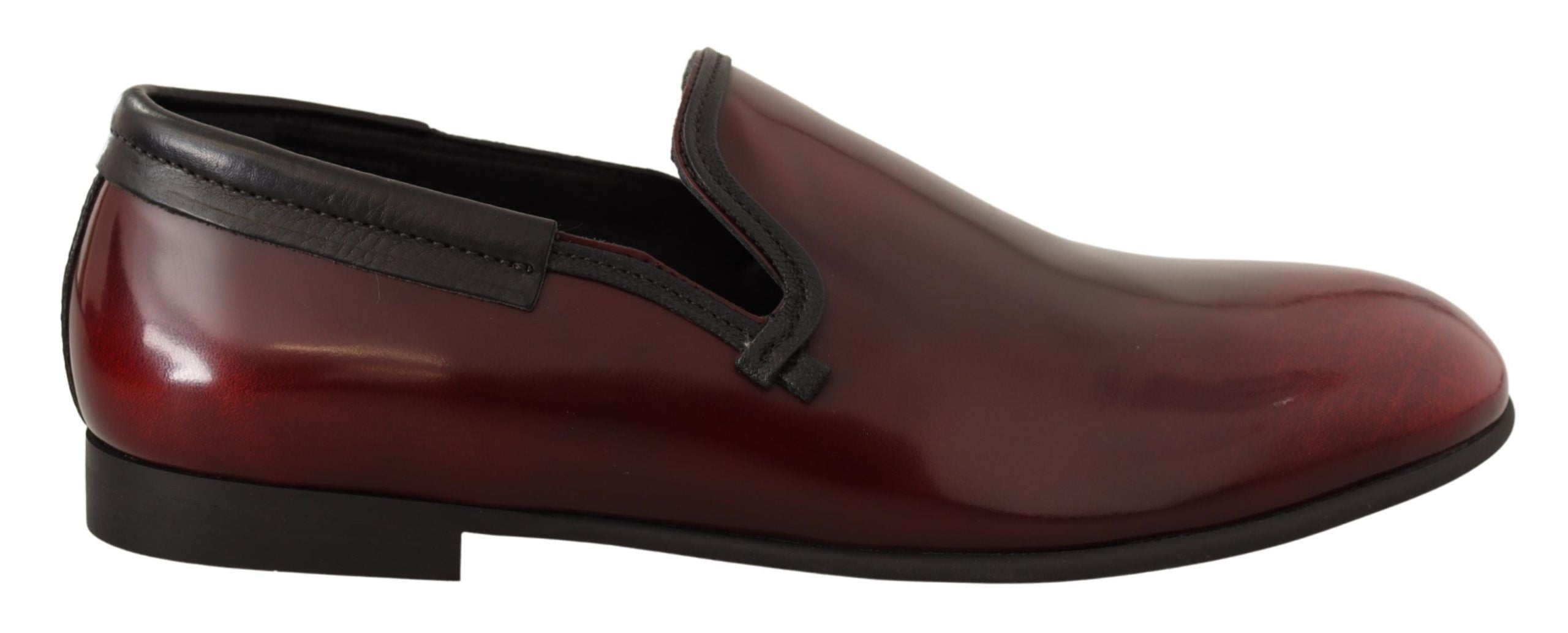 Dolce & Gabbana Bordeaux patent leather dress loafers shoes with sleek design and polished finish.