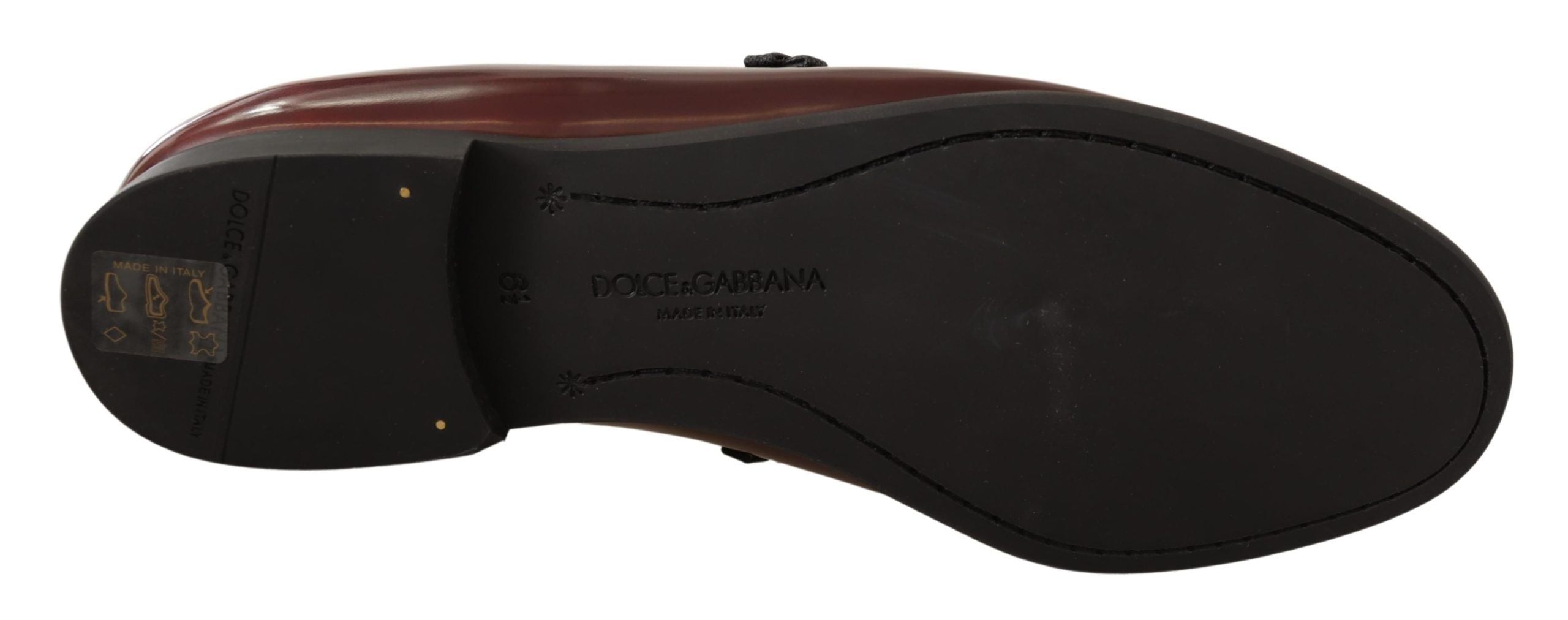 Dolce & Gabbana Bordeaux patent leather dress loafers shoes, stylish men's footwear with a sleek finish and classic design.