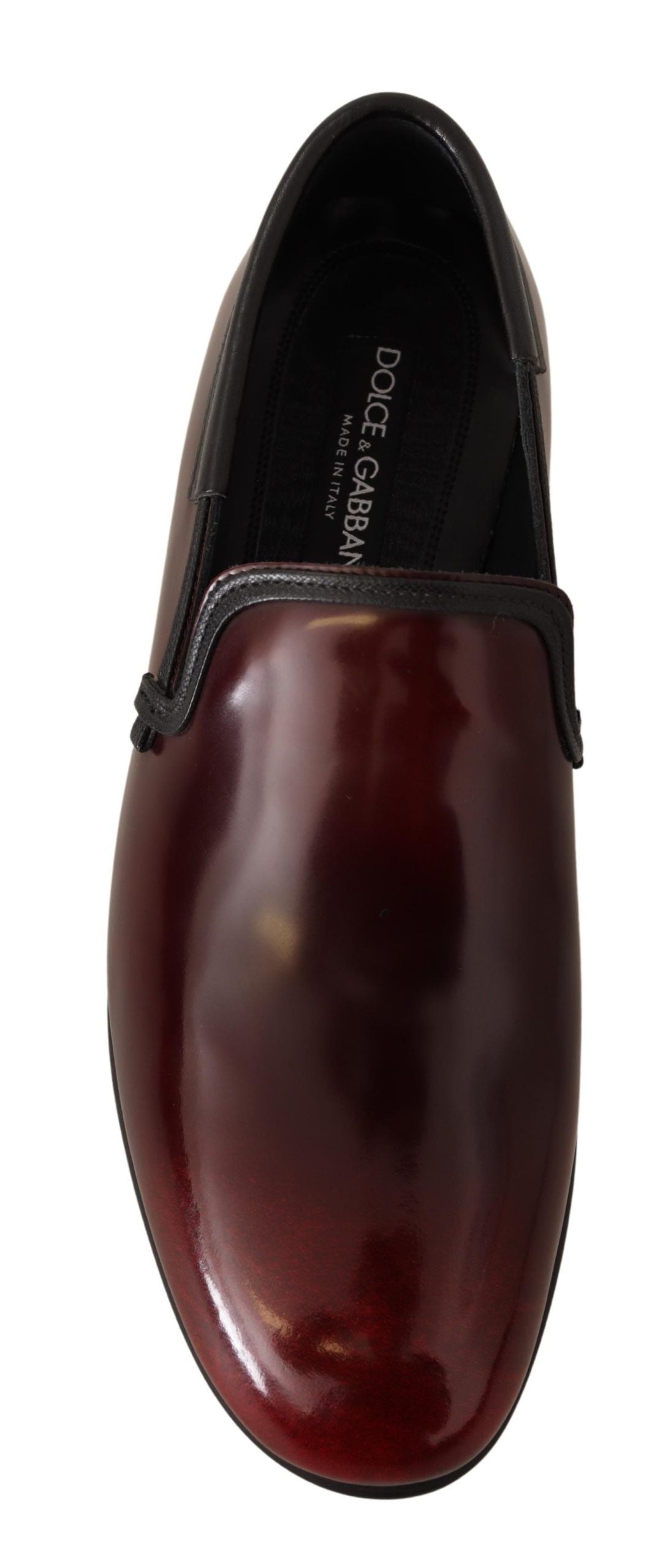 Dolce & Gabbana Bordeaux patent leather dress loafers shoes with sleek design and polished finish.