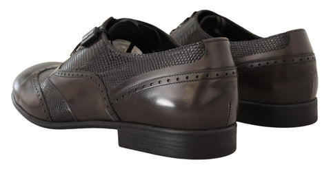 Brown lizard skin leather Oxford dress shoes by Dolce & Gabbana with sleek, polished finish and classic lace-up design.