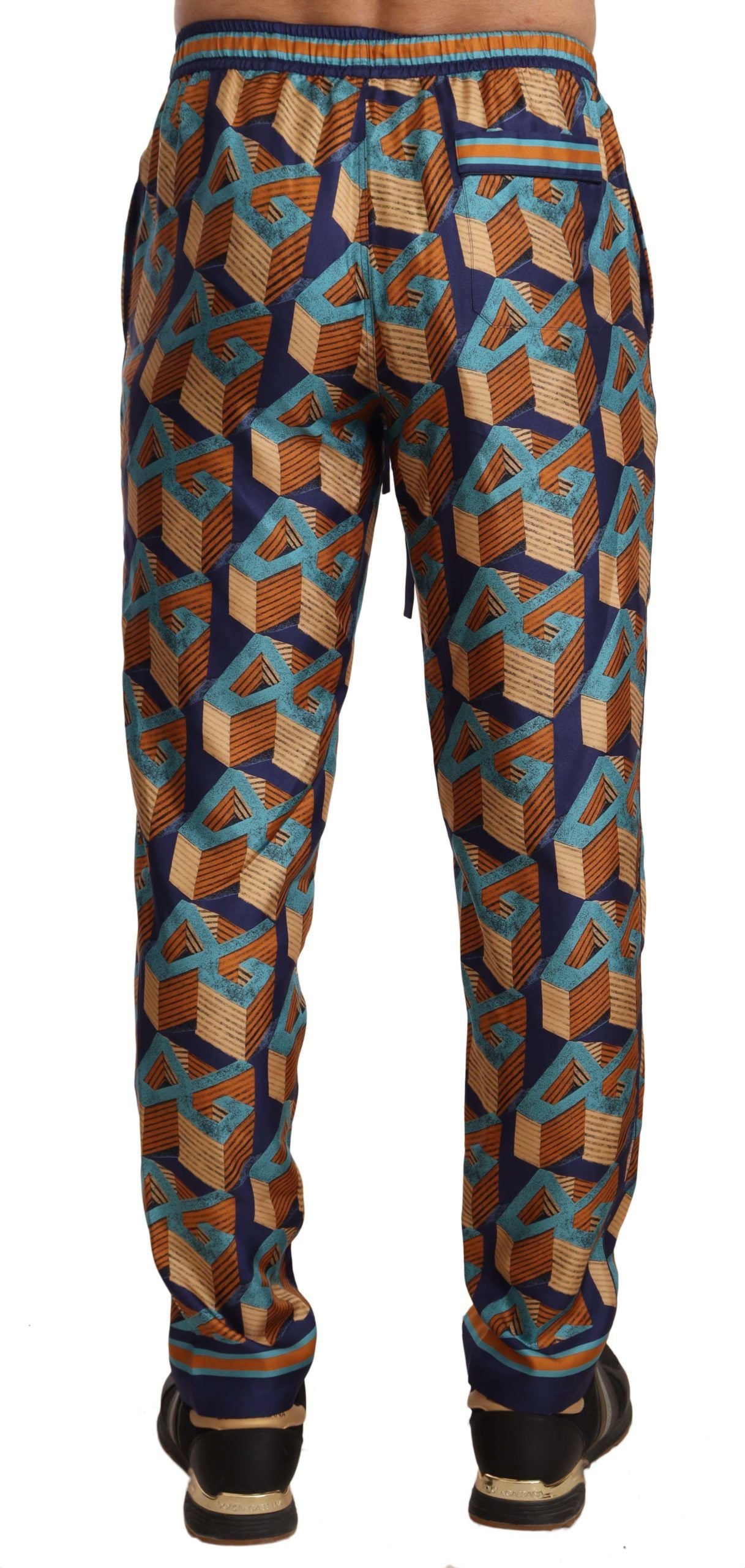 Multicolor patterned silk jogger pants by Dolce & Gabbana, featuring vibrant design and relaxed fit.