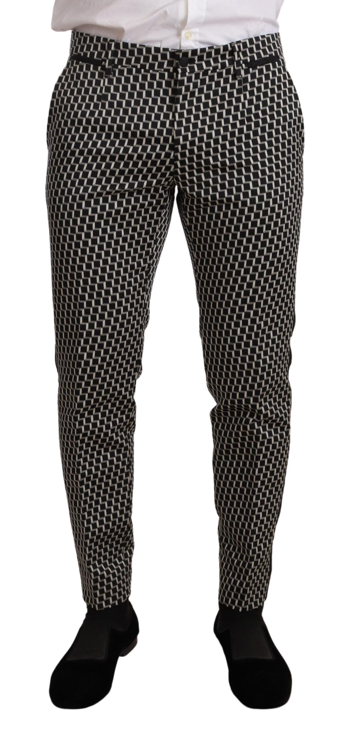 Black and white check 3-piece Martini suit by Dolce & Gabbana, featuring tailored jacket, vest, and trousers.