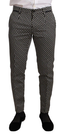 Black and white check 3-piece Martini suit by Dolce & Gabbana, featuring tailored jacket, vest, and trousers.