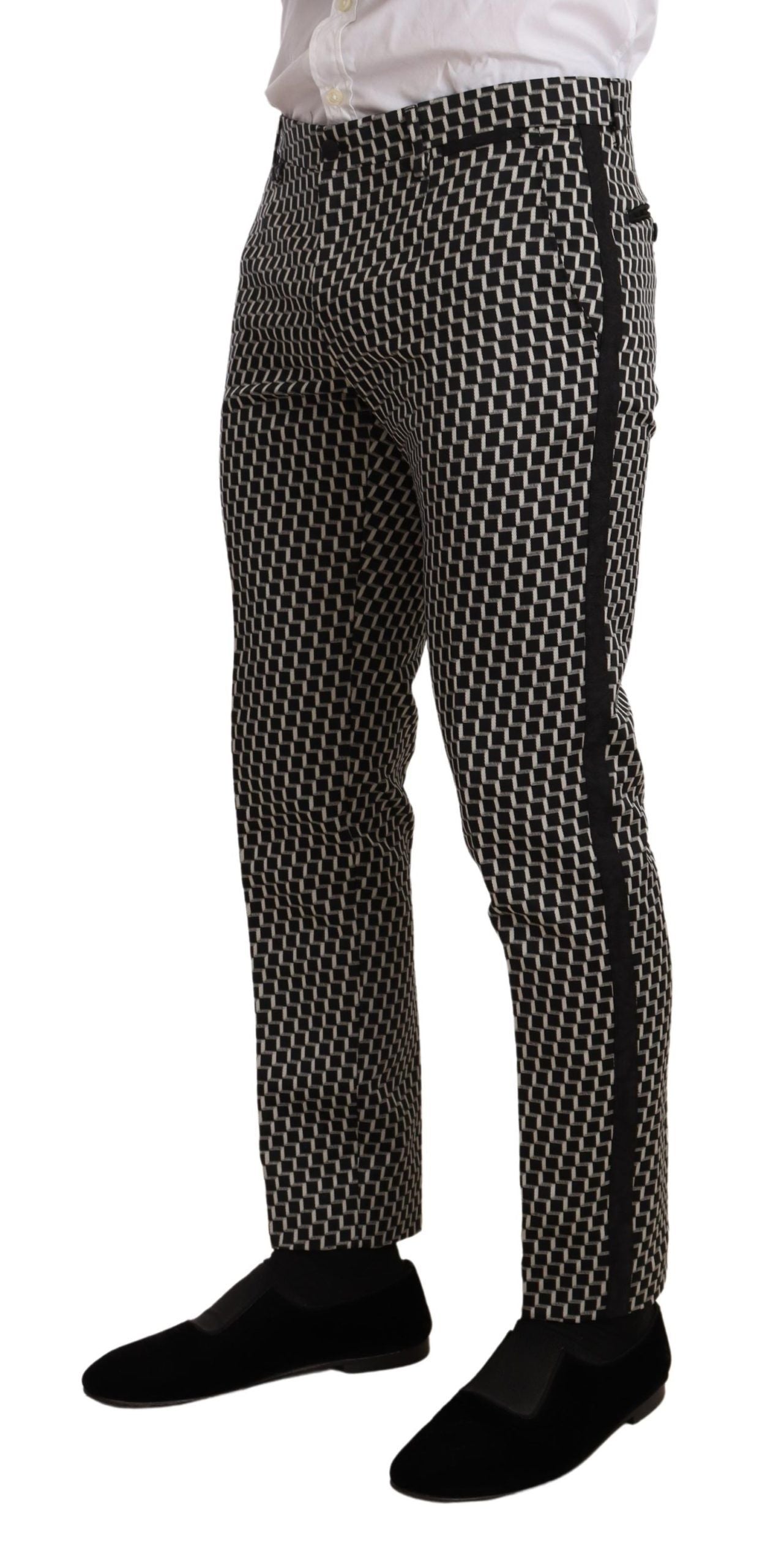 Dolce & Gabbana black and white check Martini suit with three-piece design, featuring tailored jacket, vest, and trousers.