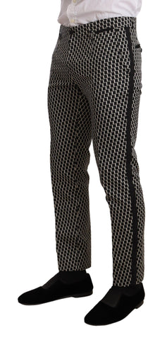 Dolce & Gabbana black and white check Martini suit with three-piece design, featuring tailored jacket, vest, and trousers.