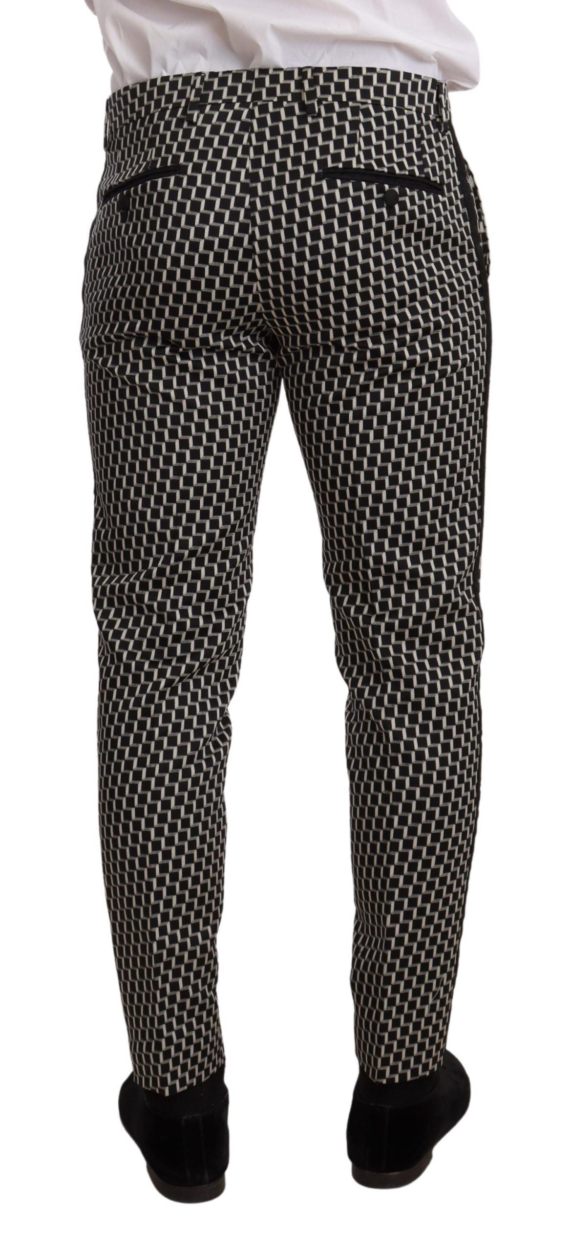 Black and white check 3-piece Martini suit by Dolce & Gabbana, featuring a tailored jacket, vest, and trousers.
