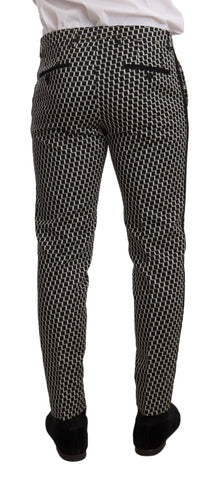Black and white check 3-piece Martini suit by Dolce & Gabbana, featuring a tailored jacket, vest, and trousers.