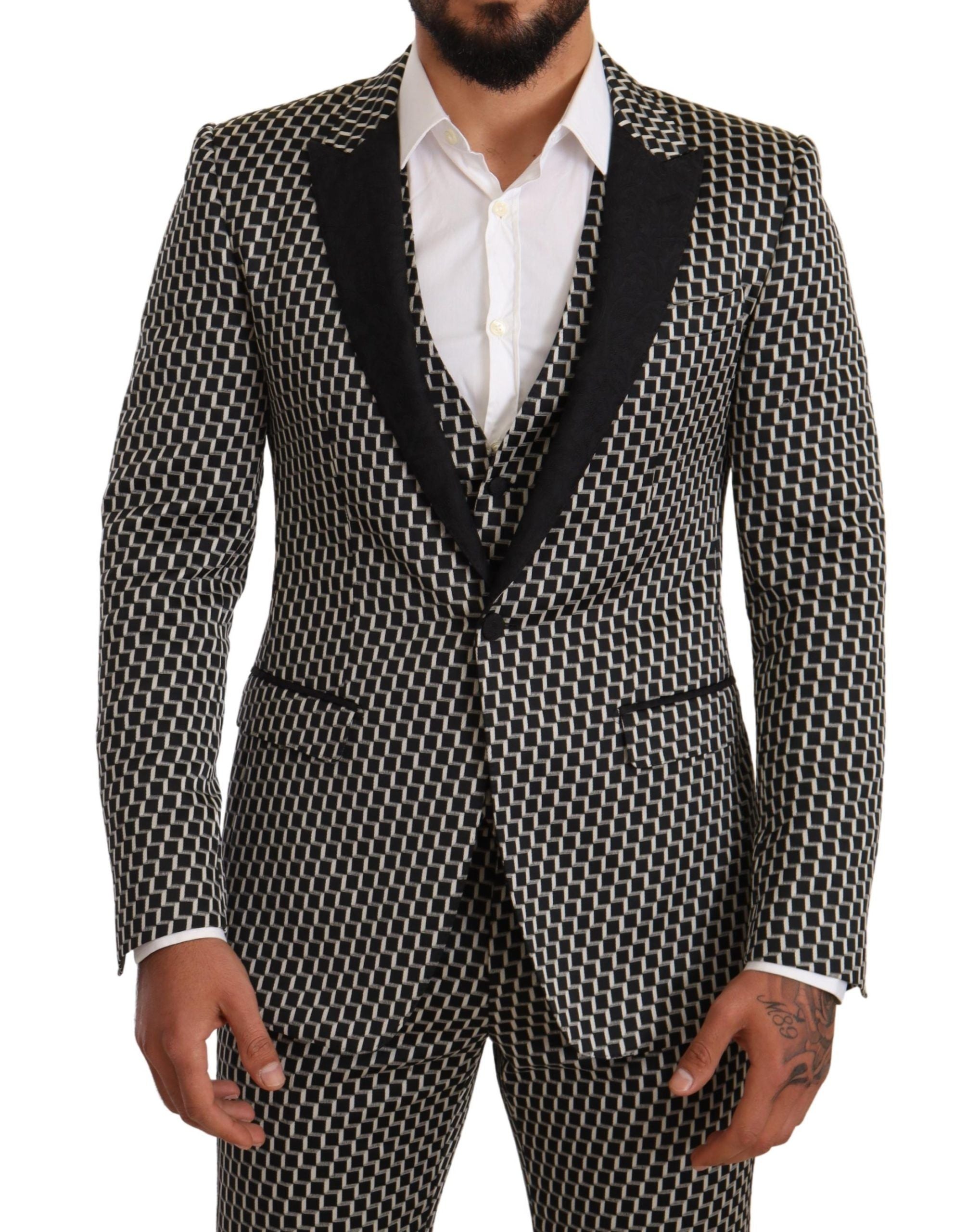 Dolce & Gabbana black and white check 3-piece Martini suit set, including jacket, trousers, and waistcoat, on a mannequin.