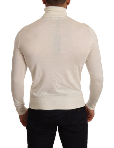 Cream Dolce & Gabbana cashmere turtleneck pullover sweater displayed on a mannequin, showcasing soft, luxurious knit fabric.