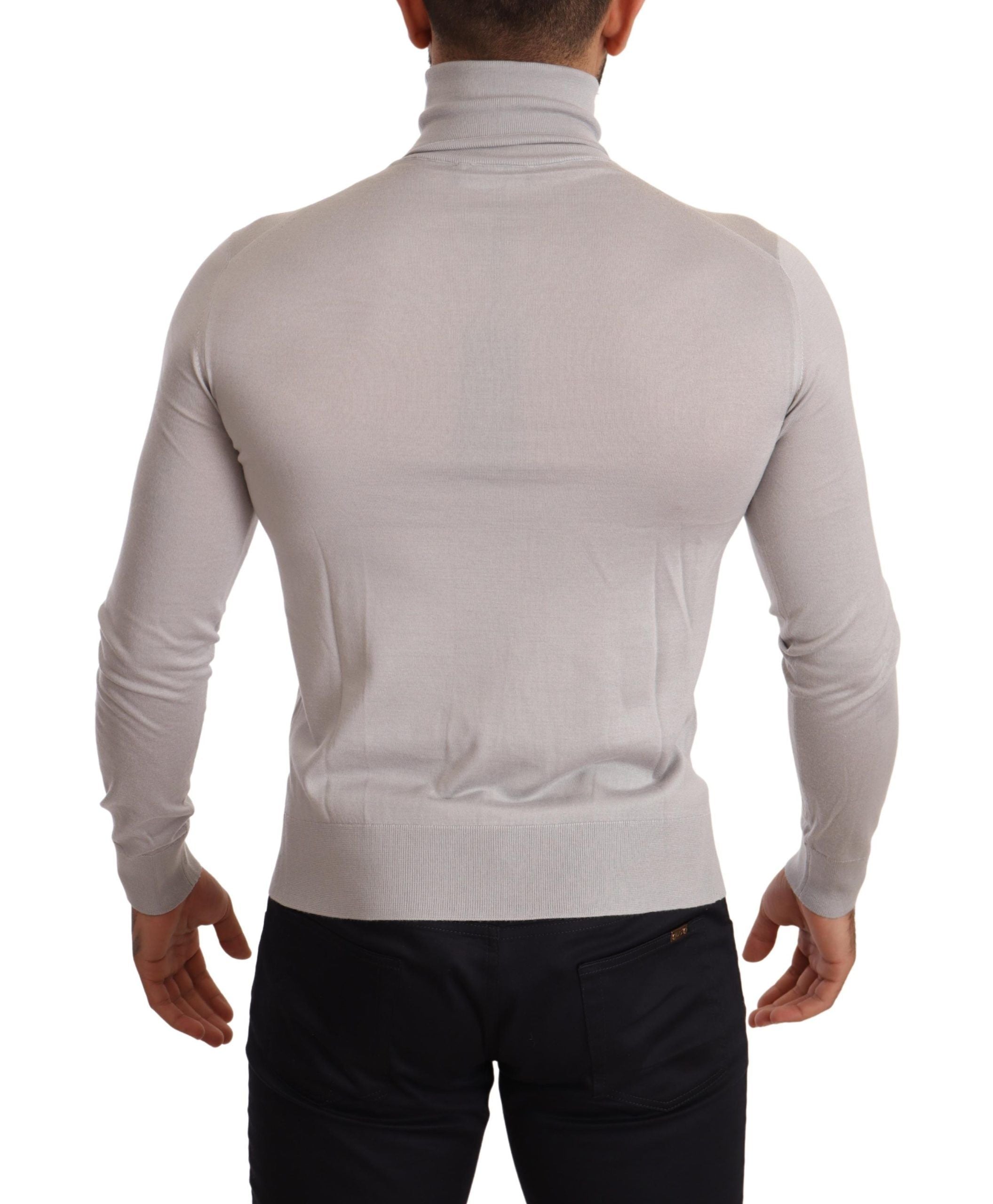 Gray cashmere turtleneck pullover sweater by Dolce & Gabbana, close-up of soft knit fabric and classic collar detail.