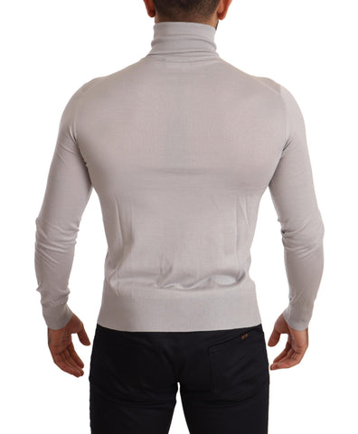 Gray cashmere turtleneck pullover sweater by Dolce & Gabbana, close-up of soft knit fabric and classic collar detail.