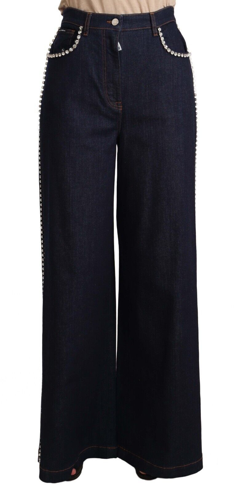 Dark blue flare jeans by Dolce & Gabbana with crystal embellishments and high-waisted fit, shown draped on a model.