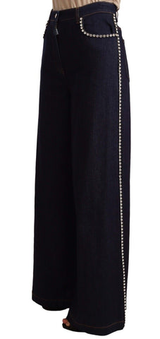 Dark blue Dolce & Gabbana flare jeans with crystal embellishments and a high-waist fit.