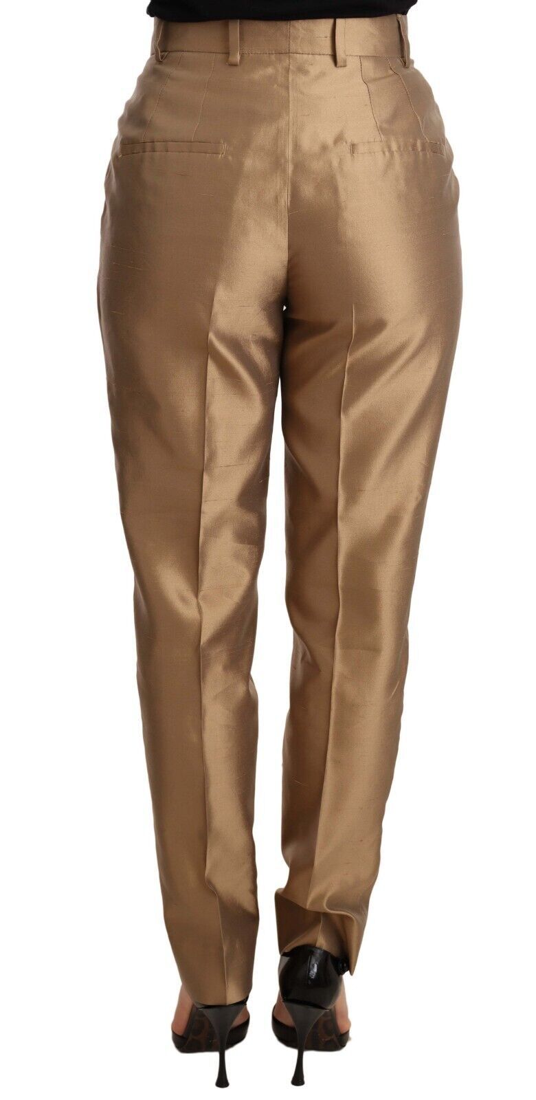 Gold silk tapered trousers with metallic finish from Dolce & Gabbana, displayed on a model.
