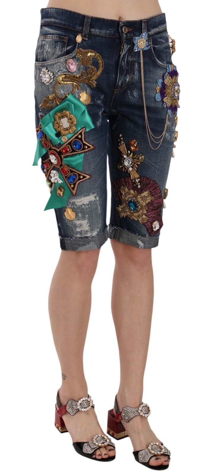 Blue denim mid-waist Capri shorts with crystal embellishments from Dolce & Gabbana, shown on a model.