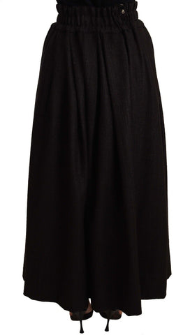 Black wool high waist maxi skirt by Dolce & Gabbana, featuring a flowing design and elegant high-rise fit.