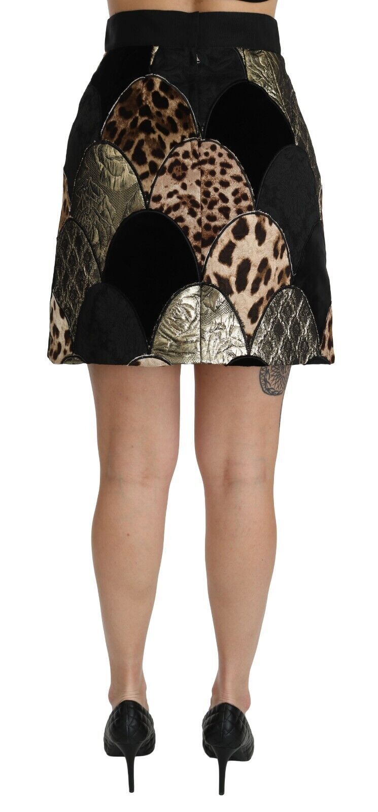 Multicolor leopard print high waist mini skirt by Dolce & Gabbana, featuring bold pattern and fitted style.