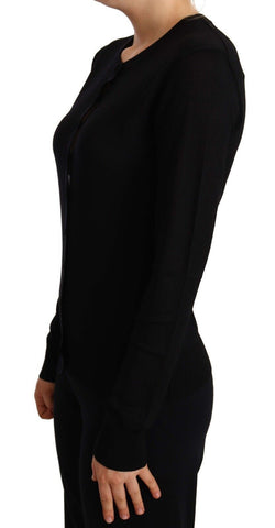Dolce & Gabbana black crewneck wool pullover sweater with staff logo, shown on a model.