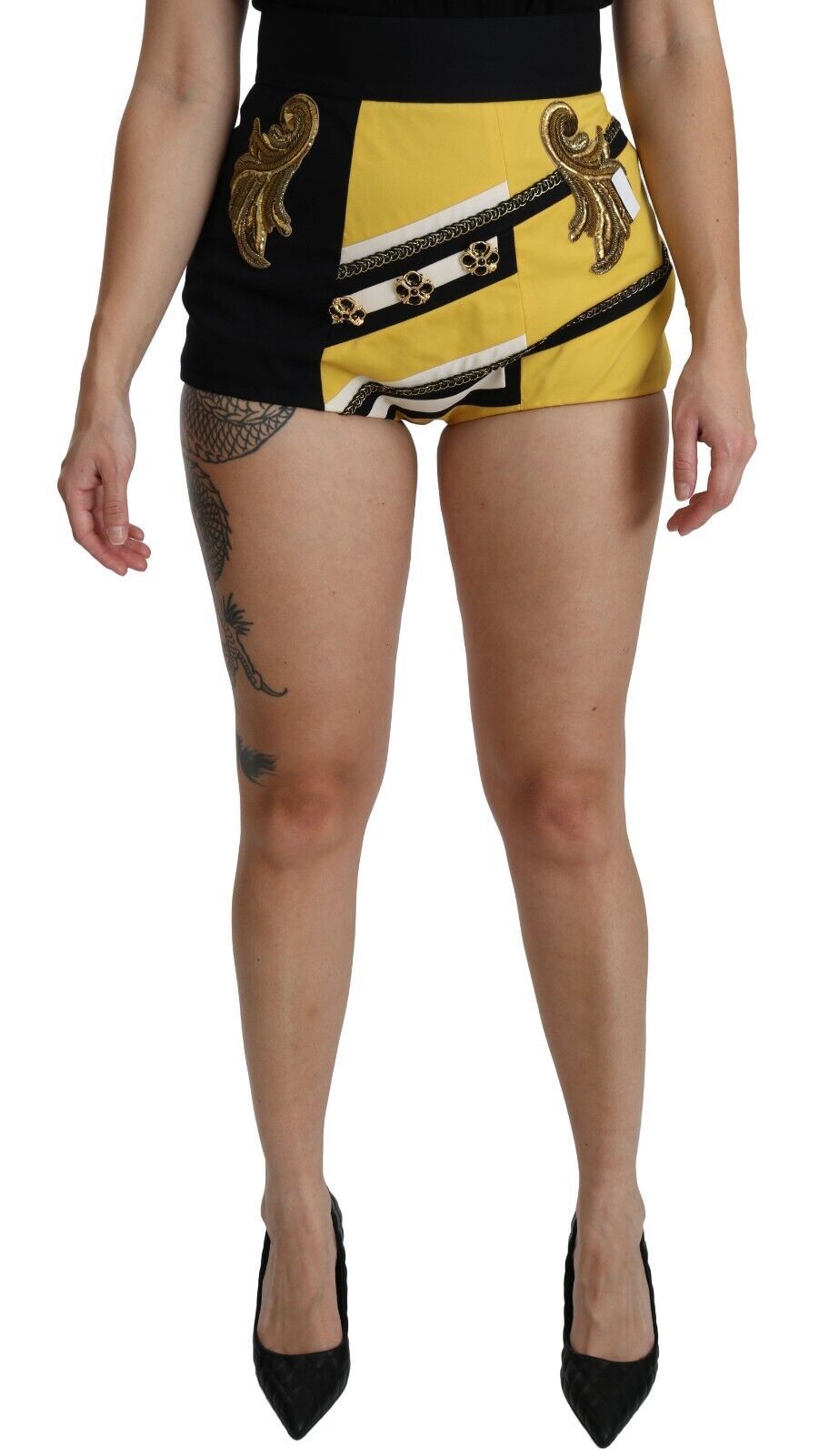 Yellow and black cotton hot pants shorts with jeweled embellishments by Dolce & Gabbana, featuring a stylish, fitted design.