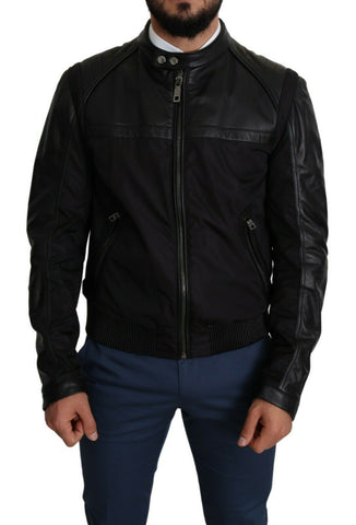 Black nylon full zip men's bomber coat jacket by Dolce & Gabbana, shown with front view and zip closure.
