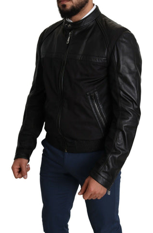Black nylon full zip men's bomber coat jacket by Dolce & Gabbana, featuring a sleek design and full front zipper.