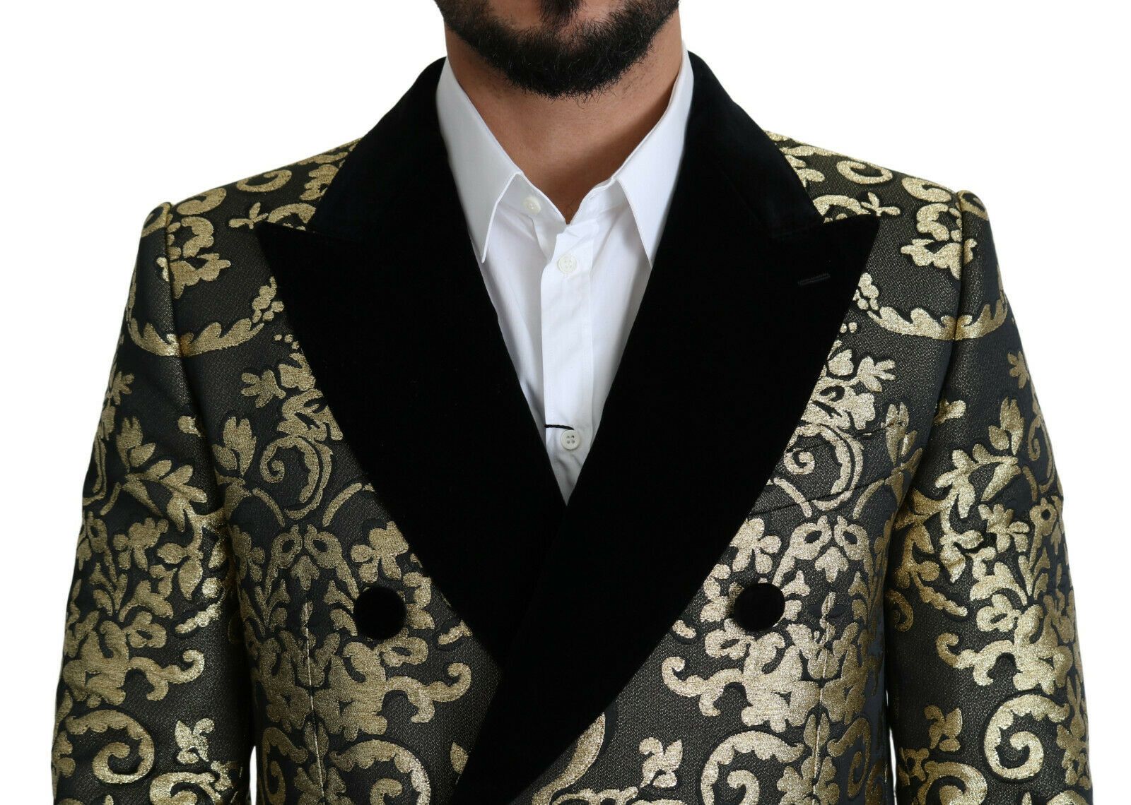 Black gold jacquard long coat from Dolce & Gabbana Sicilia jacket collection, showcasing intricate pattern and elegant design.