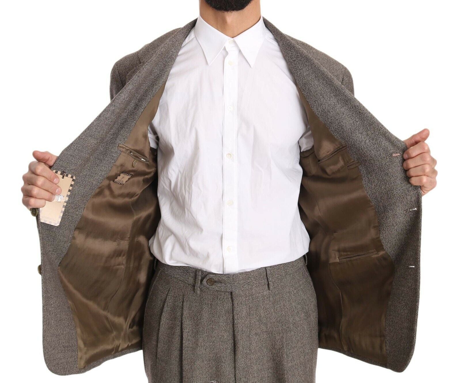 Brown wool Fendi single-breasted suit jacket with notch lapels and tailored fit, displayed on a hanger.