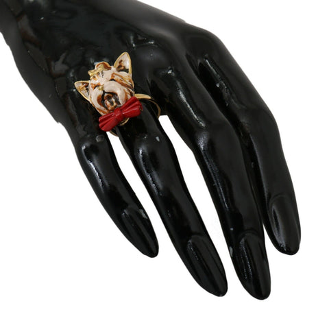 Beige dog-themed accessory by Dolce & Gabbana featuring a gold brass resin ring with branded details.