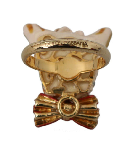 Beige dog-themed pet accessory by Dolce & Gabbana featuring a gold brass resin ring, stylish and decorative pet jewelry.