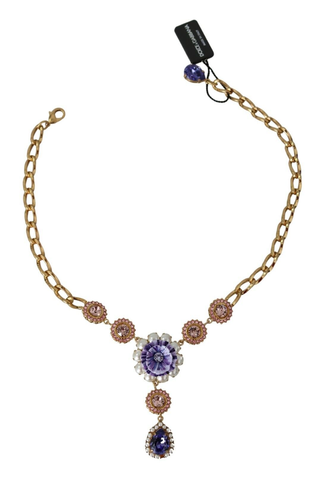 Pink gold brass pendant with purple pearls and crystals, elegant jewelry piece by Dolce & Gabbana.