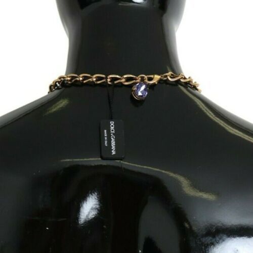 Pink gold brass pendant with purple pearl and crystal accents from Dolce & Gabbana, showcasing elegant jewelry design.