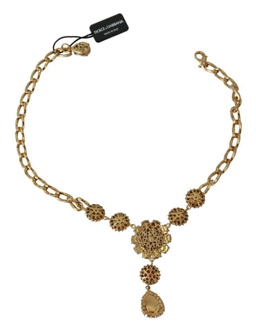 Pink gold brass pendant with purple pearls and crystals, elegant jewelry piece by Dolce & Gabbana.