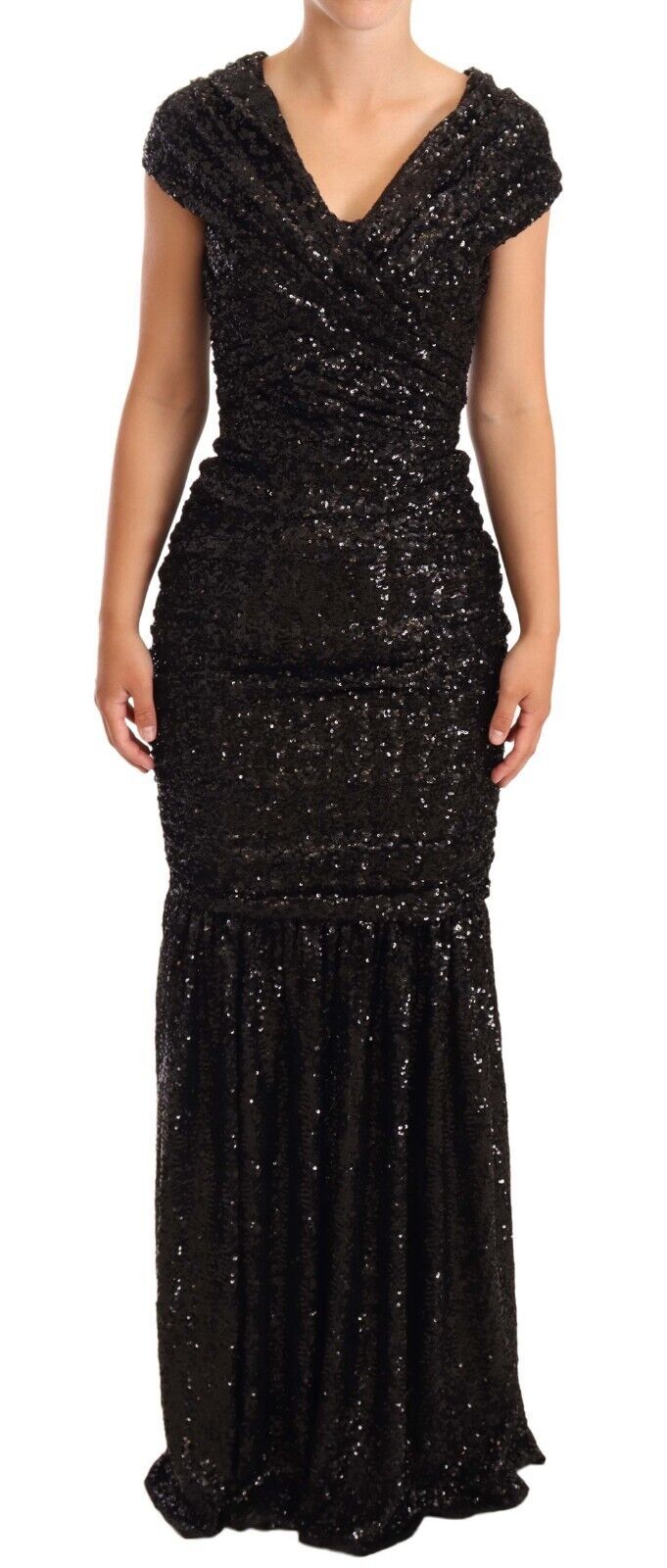 Black sequined open shoulder long gown dress by Dolce & Gabbana, featuring elegant long sleeves and a flowing silhouette.