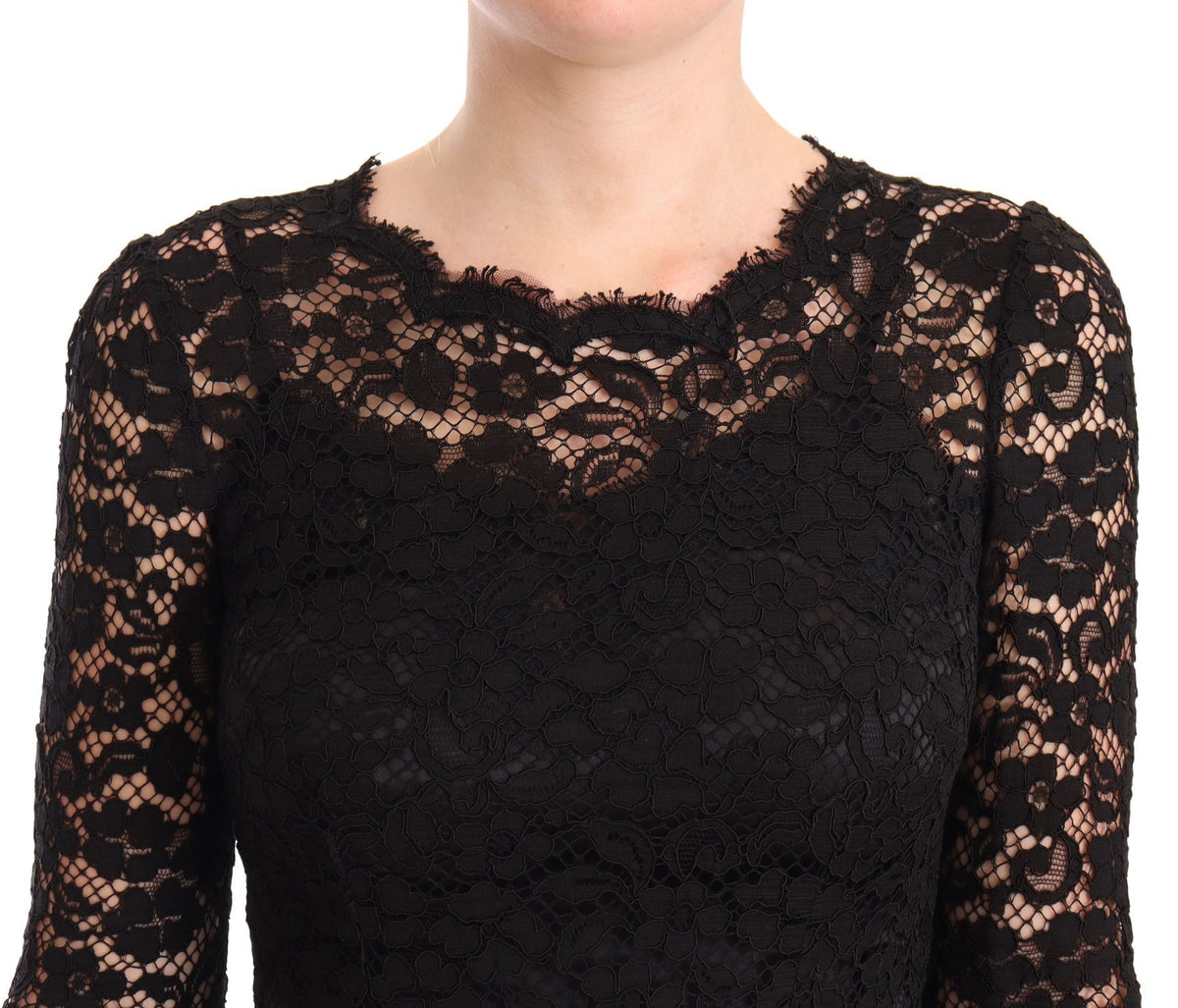 Black cotton lace mermaid long sleeve dress by Dolce & Gabbana, featuring fitted silhouette and intricate lace details.