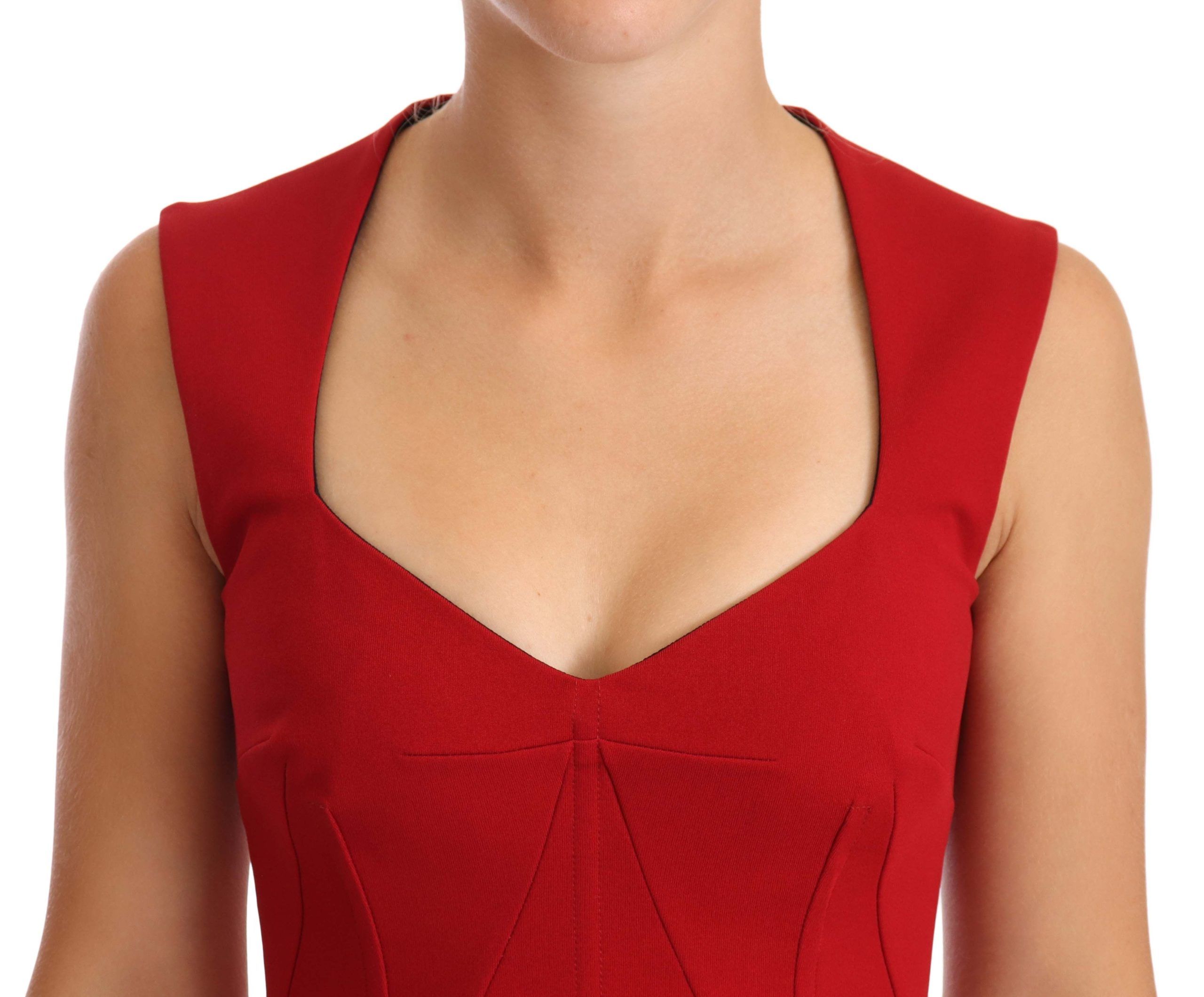 Red sweetheart sleeveless midi dress by Dolce & Gabbana, featuring a fitted stretch fabric and elegant design.
