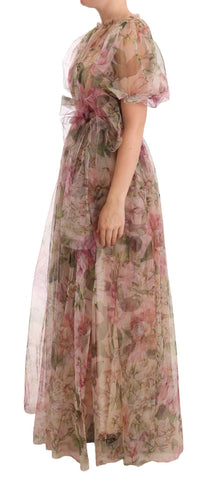 Multicolor floral print long maxi gown dress by Dolce & Gabbana with flowing fabric and vibrant floral pattern.