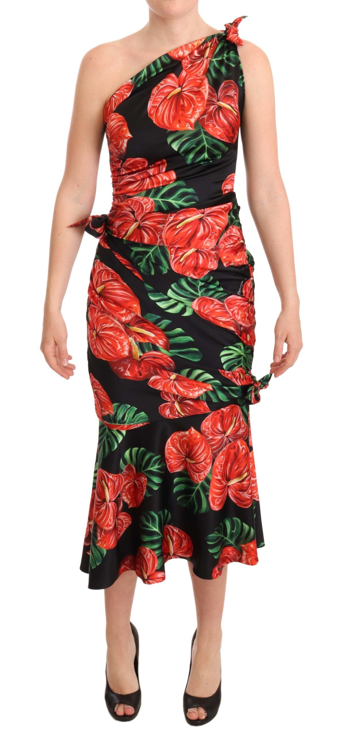 Black shiny silk floral print draped dress by Dolce & Gabbana, featuring elegant fabric and intricate floral design.