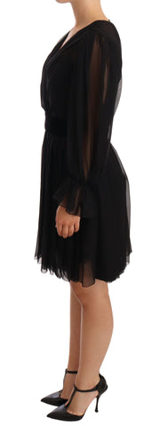 Black mesh pleated mini silk stretch dress by Dolce & Gabbana, featuring a fitted silhouette and elegant pleated design.