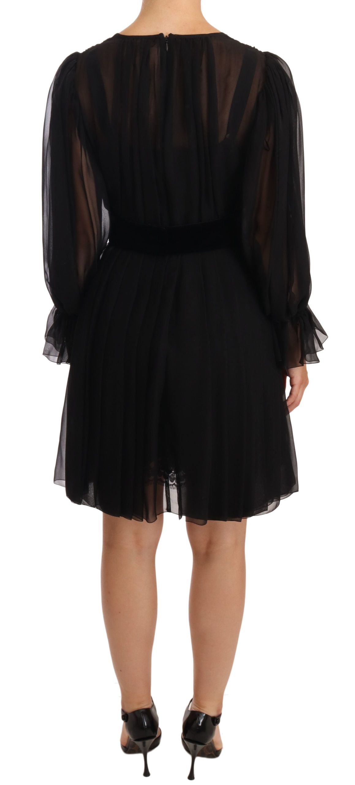 Black mesh pleated mini silk stretch dress by Dolce & Gabbana, featuring a fitted silhouette and elegant pleated design.