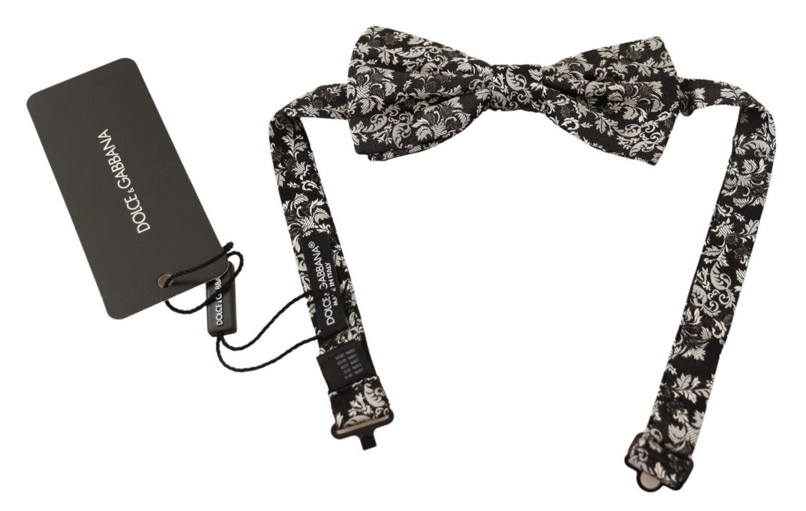 Multicolor floral adjustable neck papillon bow tie by Dolce & Gabbana, featuring vibrant floral patterns and elegant design.